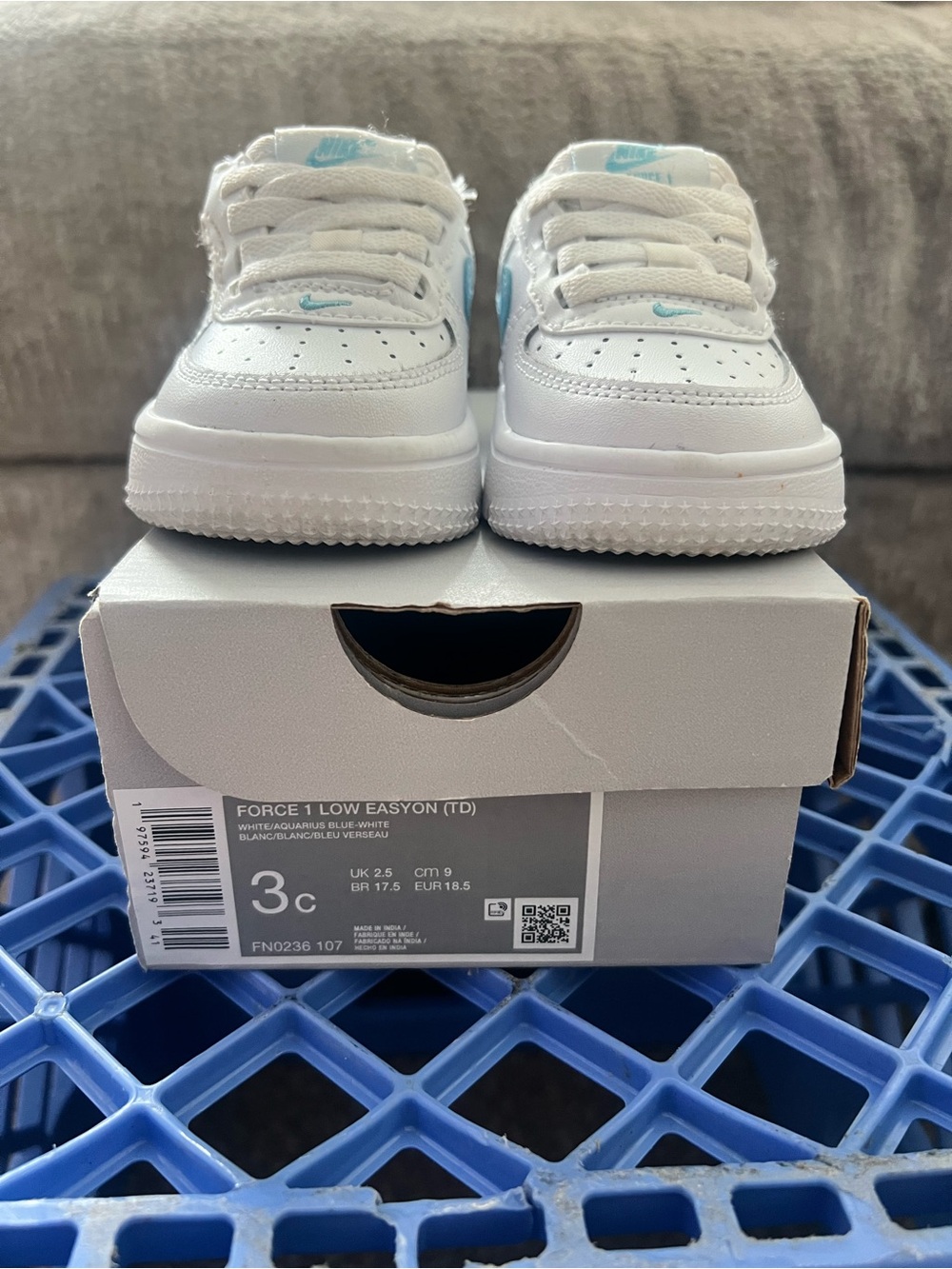 Nike Kids White Sneakers with Light Blue Accents